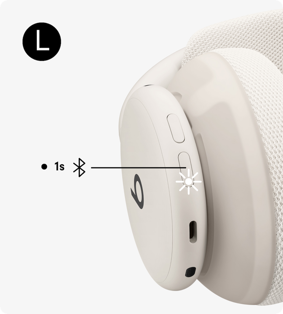 状态指示灯亮起的 Beats 360 电源按钮特写