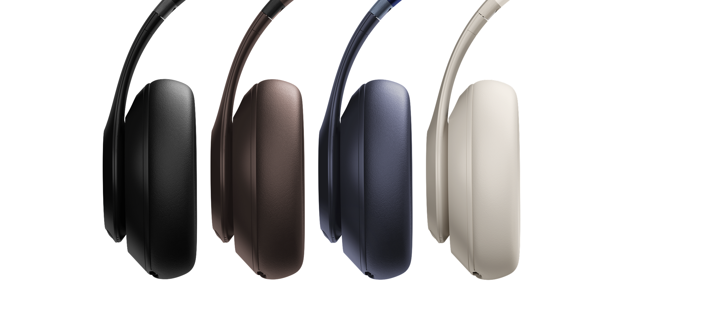 Beats Studio Pro headphones shown in every color lined up next to each other. 