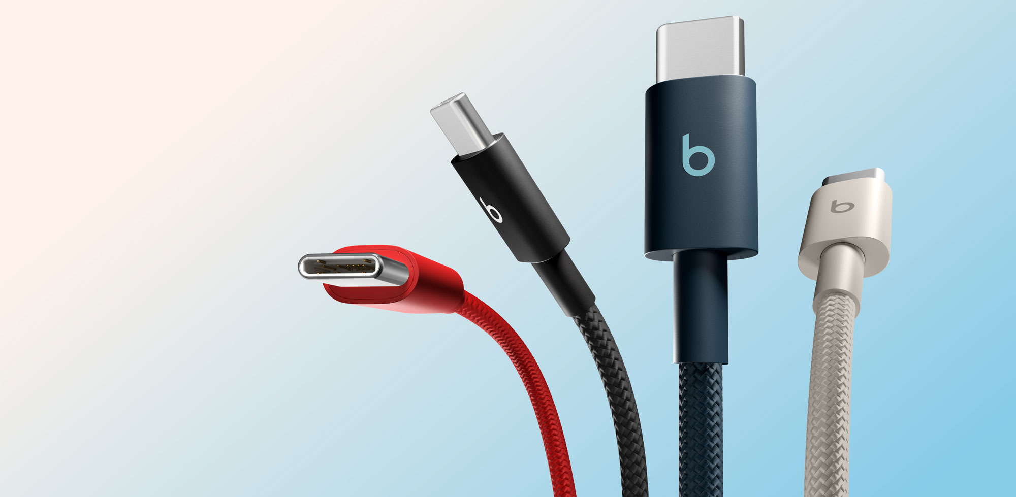 四款配色的 Beats 充电线：奔涌灰、闪电黑、飚速蓝和劲速红。