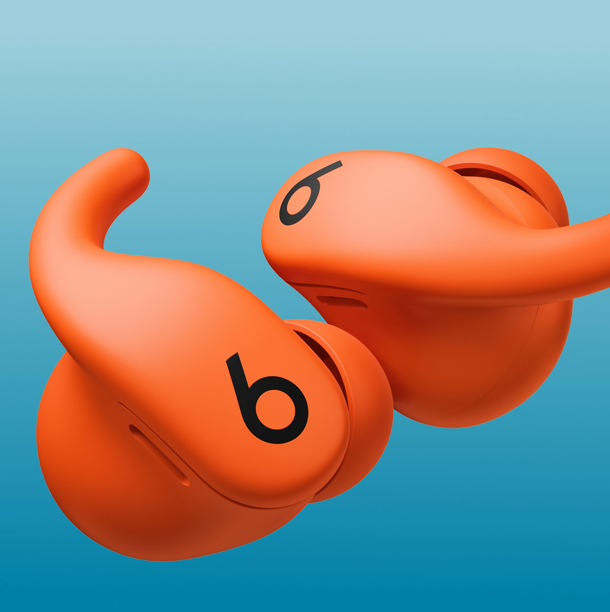 高燃橙 Powerbeats Fit。