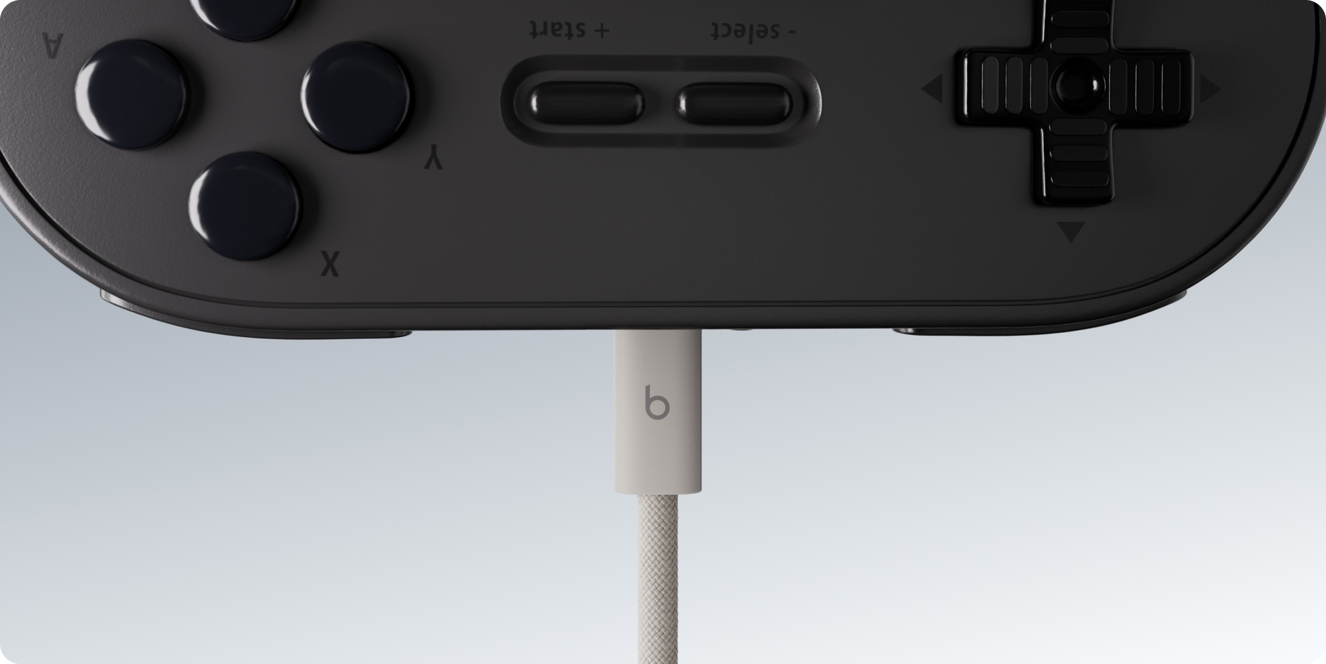 Beats USB-C 连接线插入手机、平板电脑、耳机和游戏手柄。