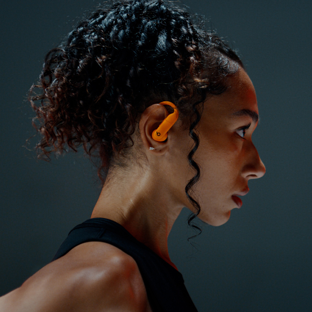 side view of female wearing Powerbeats Pro 2